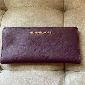 Purple with gold accent Michael Kors wallet